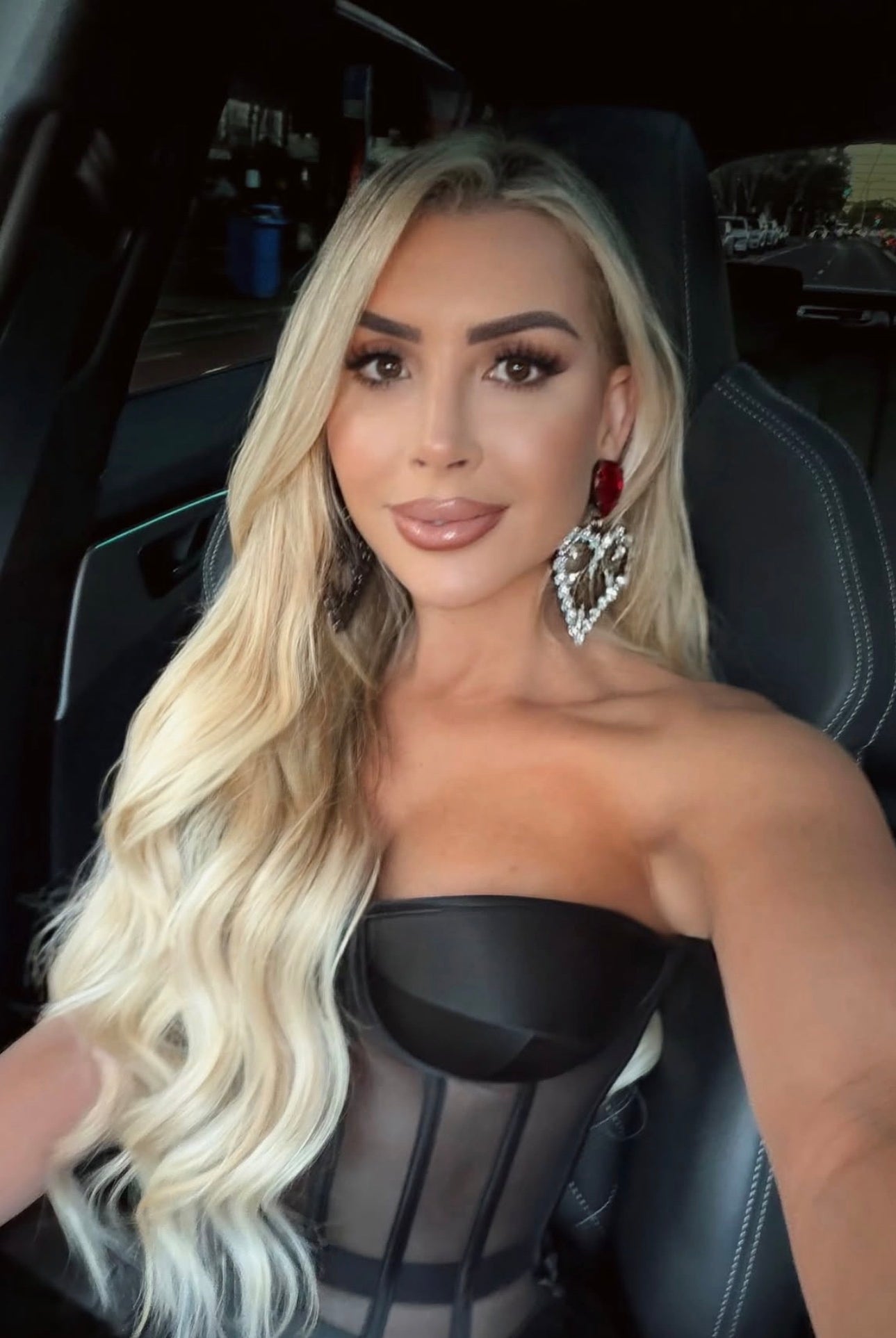 SACRED HEART RUBY & CRYSTAL EARRINGS by House of Emmanuel available for hire in Bondi, NSW