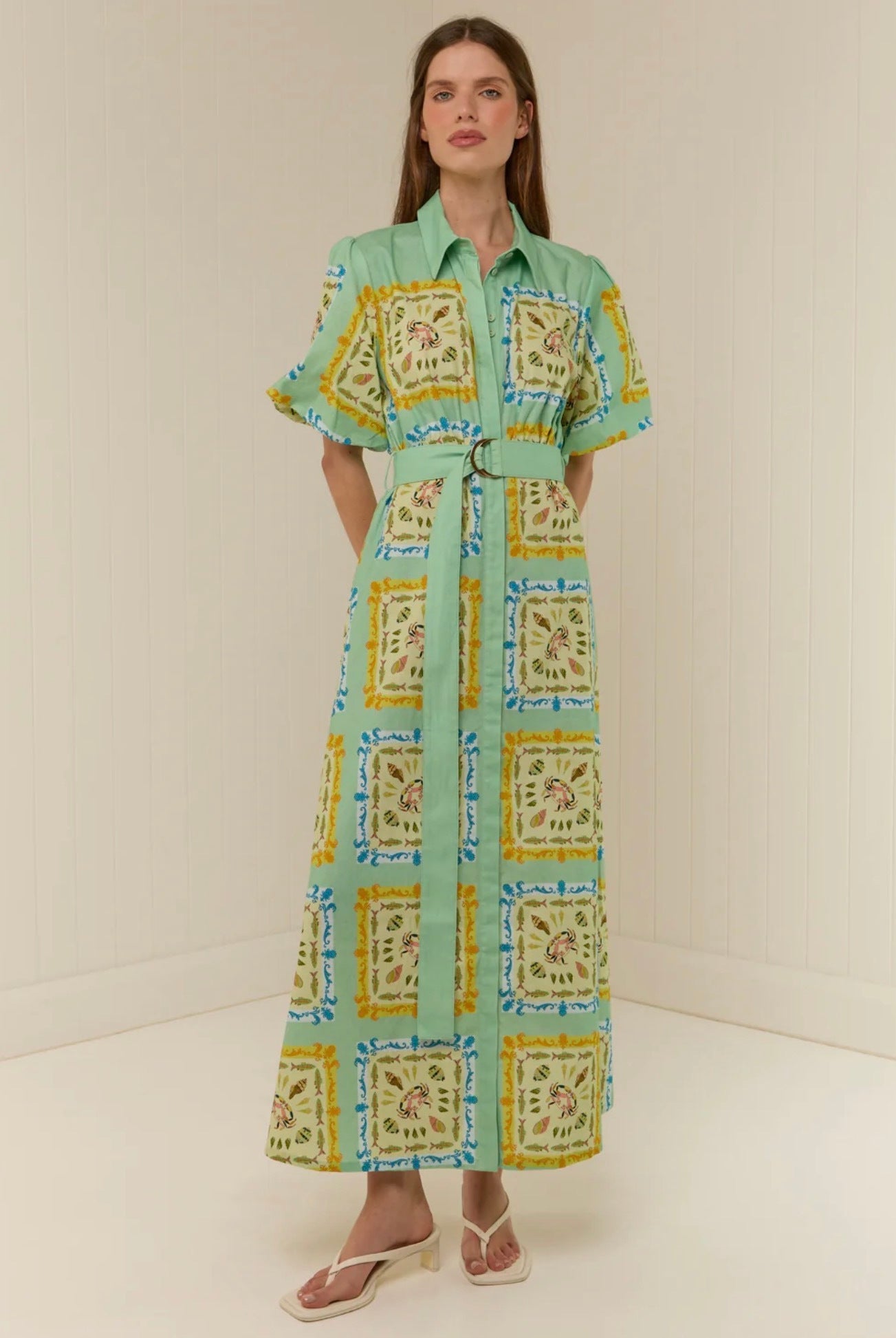 The Paddi Dress in our exclusive Saya Shells by Palm Noosa available for hire in Camp Hill, QLD