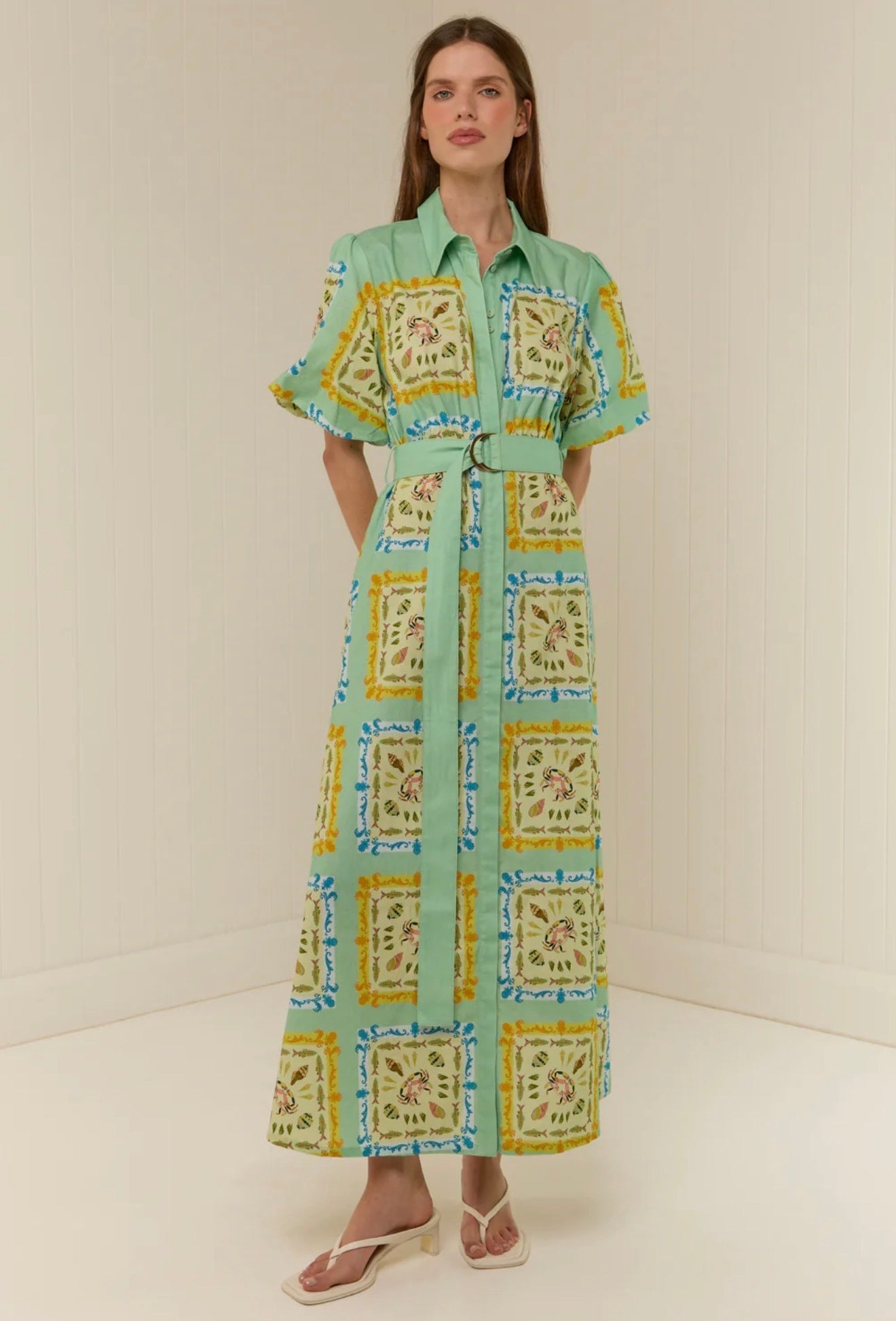 The Paddi Dress in our exclusive Saya Shells by Palm Noosa available for hire in Camp Hill, QLD