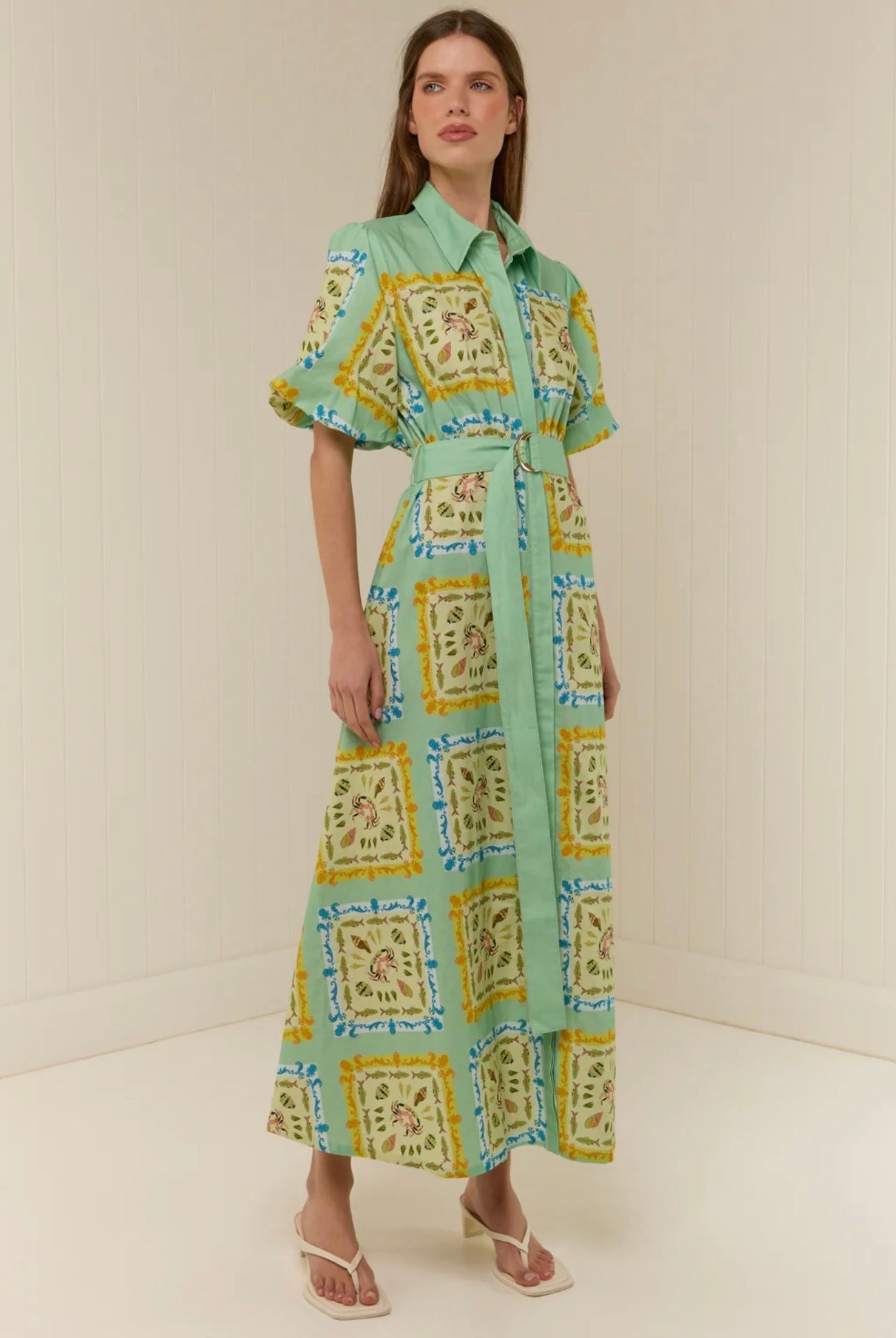 The Paddi Dress in our exclusive Saya Shells by Palm Noosa available for hire in Camp Hill, QLD