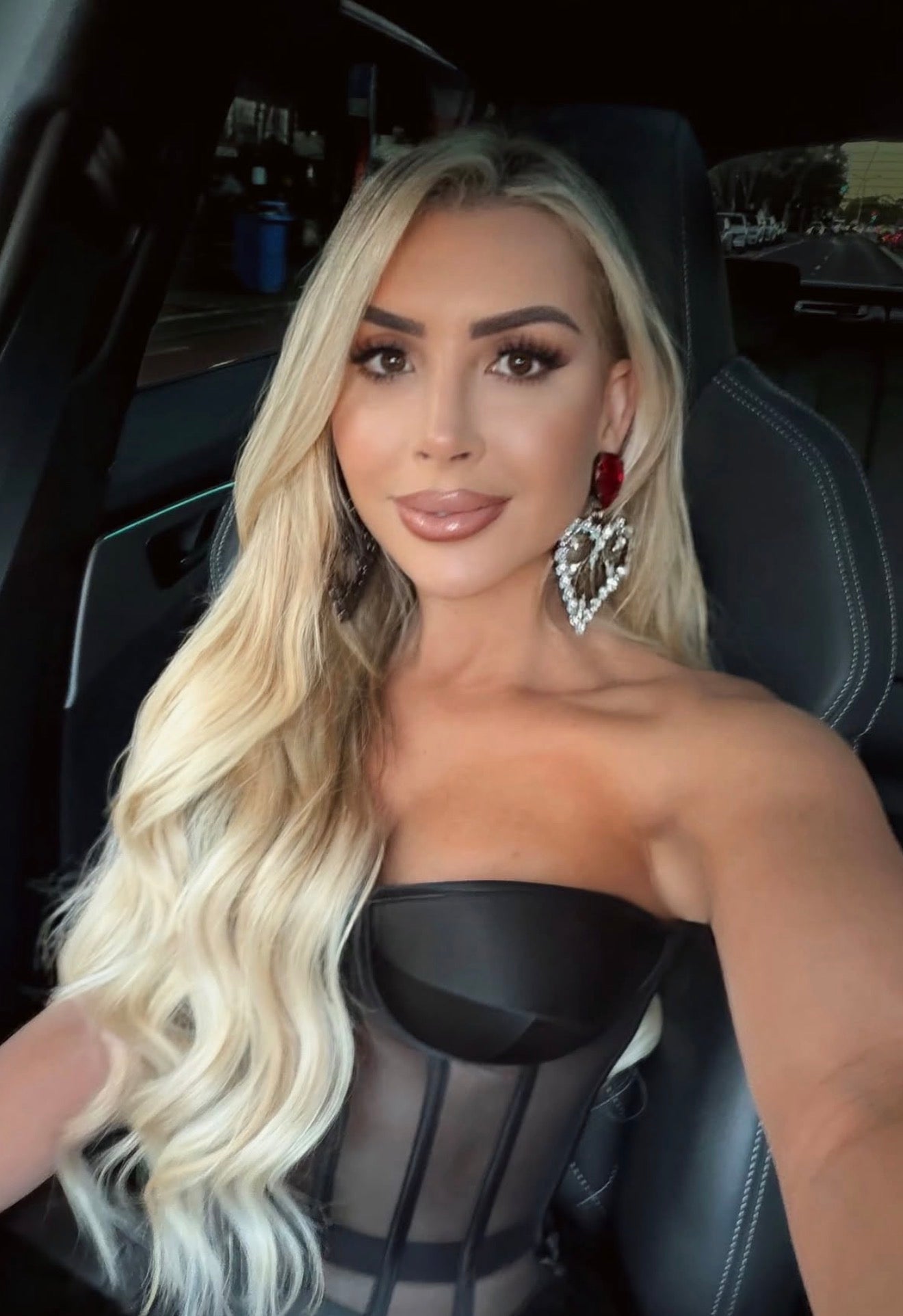 SACRED HEART RUBY & CRYSTAL EARRINGS by House of Emmanuel available for hire in Bondi, NSW