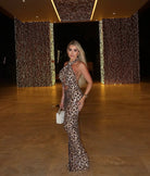 Cristine leopard sequin halter  by Jessica bara  available for hire in Bondi, NSW