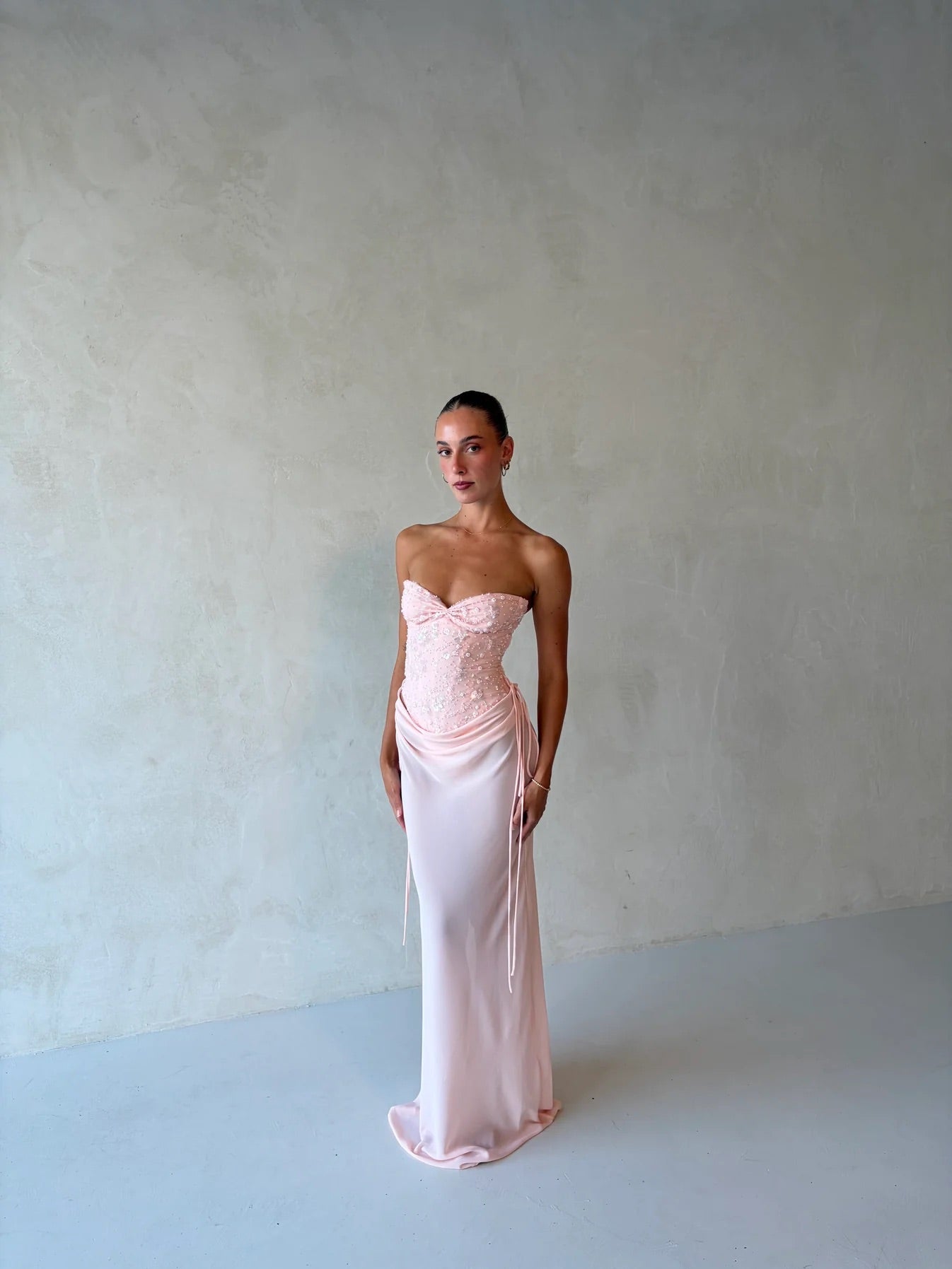 Verity Bustier + Allira Maxi Skirt in Baby Pink by Natalie Rolt available for hire in Gold Coast, QLD