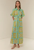 The Paddi Dress in our exclusive Saya Shells by Palm Noosa available for hire in Camp Hill, QLD