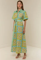The Paddi Dress in our exclusive Saya Shells by Palm Noosa available for hire in Camp Hill, QLD