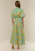 The Paddi Dress in our exclusive Saya Shells by Palm Noosa available for hire in Camp Hill, QLD
