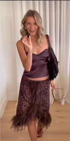Gigi leapard feather skirt and Emma top  by Bubish Luxe  available for hire in Tanilba bay , NSW