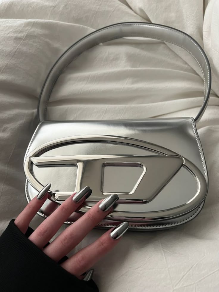 1DR-ICONIC SHOULDER BAG IN MIRRORED LEATHER by Diesel available for hire in Australia