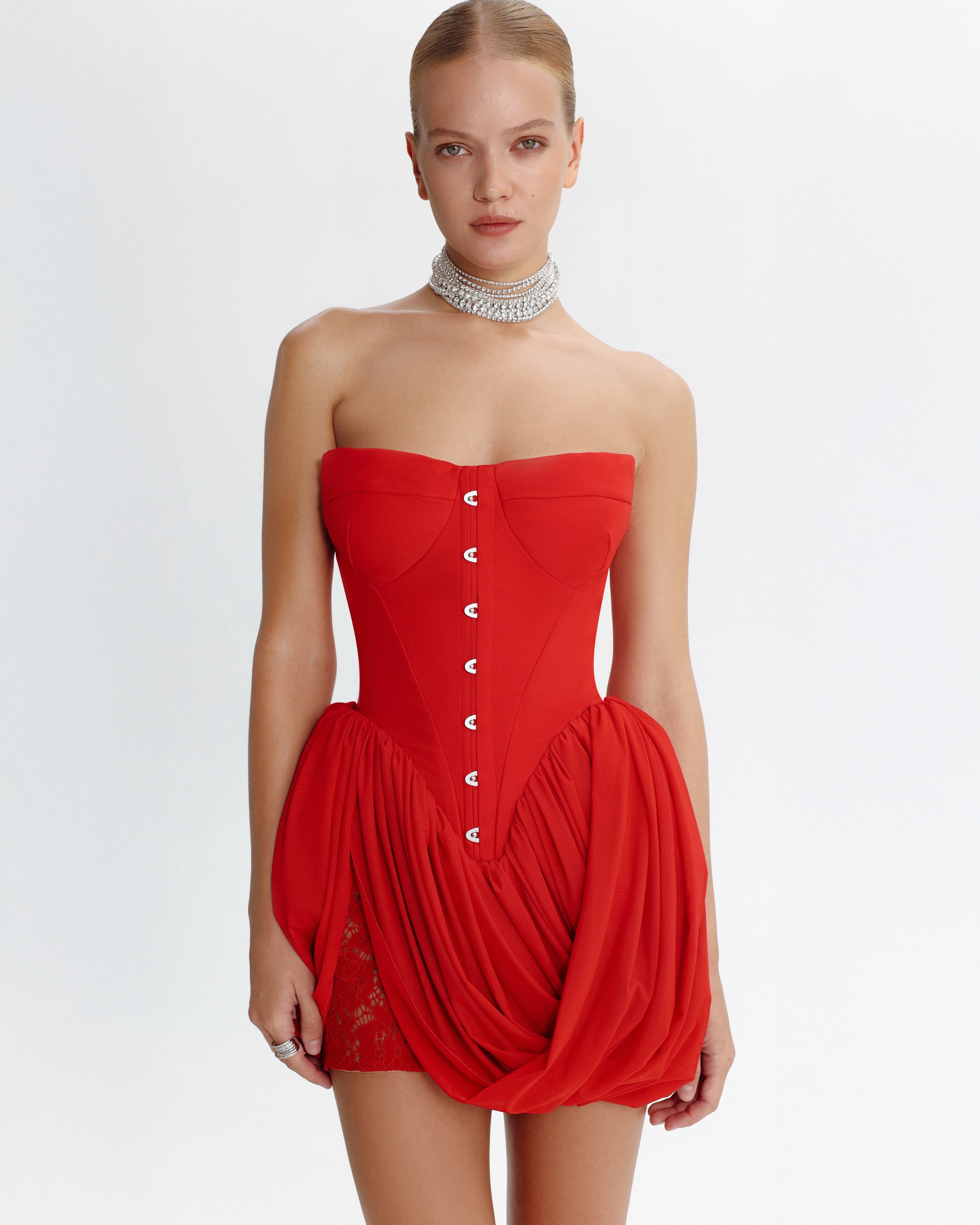 Red corset mini dress with draped skirt